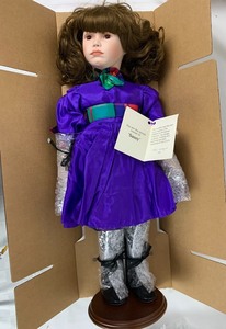 lot 82 image: World Gallery Porcelain Doll - Sassy