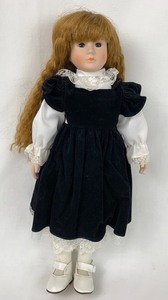 lot 98 image: Two Brinns Collectible Porcelain Dolls - Dieter and Bunnie