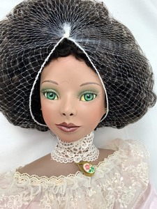 lot 103 image: World Gallery Porcelain Doll - Regina Marie