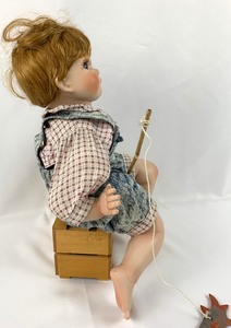 lot 114 image: World Gallery Porcelain Doll - Timmy by Cindy Marschner