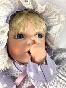 lot 118 image: World Gallery Porcelain Doll - Buttons & Bows by Holly Hunt