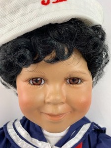 lot 123 image: World Gallery Porcelain Doll - Tyrone by Vincent De Filippo