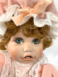 lot 134 image: World Gallery Porcelain Doll - Charity Sweet Dreams by Cindy Marschner