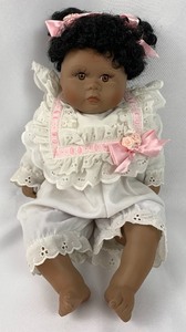 lot 139 image: World Gallery Porcelain Doll - Destina by Holly Hunt