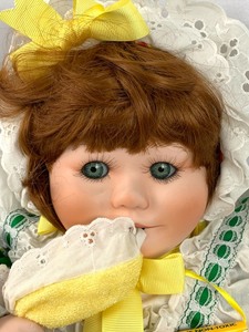 lot 142 image: World Gallery Porcelain Doll - Sunny by Holly Hunt