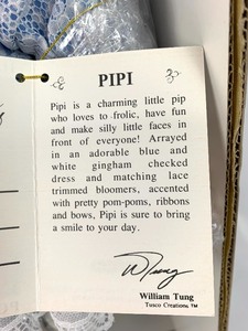 lot 149 image: Moments Treasured Porcelain Doll- Pipi by William Tung, New in Box