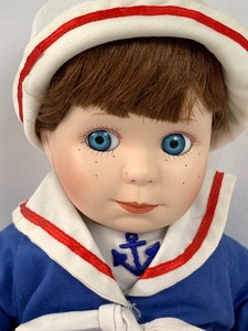 lot 156 image: Set of Two Moments Treasured Porcelain Dolls- Billy & Betsy (Twins)