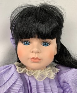 lot 157 image: Seymour Mann Porcelain Doll- Lila