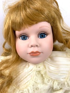 lot 158 image: Seymour Mann Porcelain Doll- Eileen