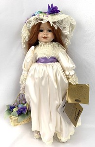 lot 159 image: Seymour Mann Porcelain Doll- Violet