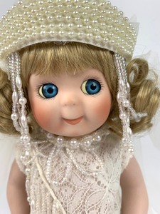 lot 180 image: World Gallery Porcelain Doll - Mrs. Rudolph ValenTootie