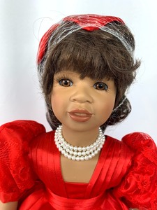lot 192 image: Debut Design Porcelain Doll