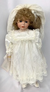 lot 194 image: Design Debut Porcelain Doll - Chantel