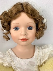 lot 195 image: Design Debut Porcelain Doll - Jill