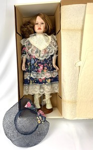 lot 199 image: World Gallery Cottage Path Porcelain Doll - Blueberry