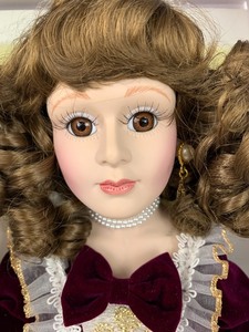 lot 203 image: Moments Treasured Porcelain Doll - Antonella - Italian Bride Doll