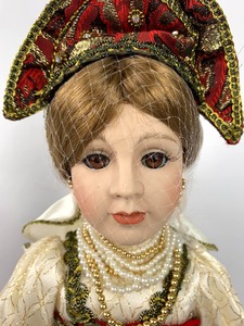 lot 205 image: Moments Treasured Porcelain Doll- Larissa, Russian Bride