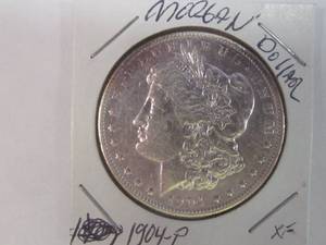 lot 36 image: Morgan dollar coin