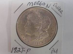 lot 39 image: Morgan dollar coin
