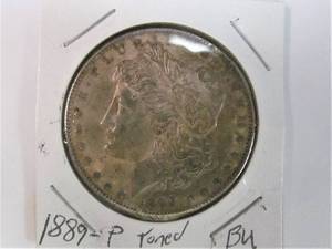 lot 41 image: Morgan dollar coin