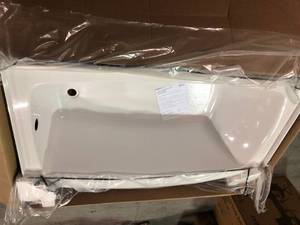 lot 14 image: American Standard Princeton 60 in. x 30 in. Americast Apron-Front Bathtub with Right Hand Drain (broken on the edge) see all pictures