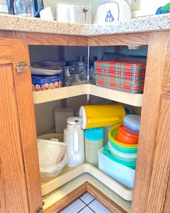 lot E116 image: Lazy Susan Corner Cabinet Contents