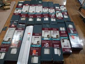 lot 1 image: Mixed lot of White Cordless Room Darkening 2.5 in. Premium Faux Wood Blind for Window - mixed conditions & sizes - see pictures