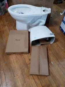 lot 3 image: Foundations 2-piece 1.28 GPF Single Flush Elongated Toilet in White by Delta - open box not used - see pictures
