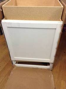 lot 31 image: Courtland Shaker Assembled 24 in. x 34.5 in. x 24 in. Stock Base Kitchen Cabinet in Polar White Finish by Hampton Bay-open box not used - see pictures