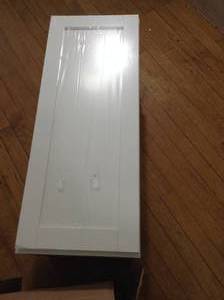 lot 37 image: Courtland Shaker Assembled 12 in. x 30 in. x 12 in. Stock Wall Kitchen Cabinet in Polar White Finish by Hampton Bay- open box not used -see pictures