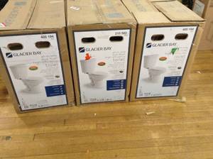 lot 46 image: Mixed lot of 2-piece Dual Flush Round Toilet in White by Glacier Bay- mixed conditions - see pictures