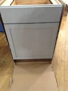 lot 51 image: Courtland Shaker Assembled 24 in. x 34.5 in. x 24 in. Stock Base Kitchen Cabinet in Sterling Gray Finish by Hampton Bay- open box not used