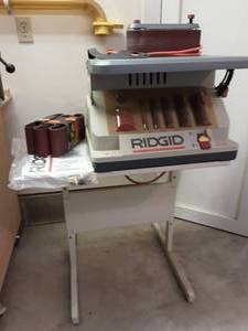 lot 36 image: Ridgid Oscillating Edge Belt Spindle Sander With Work Bench & Extra Belts