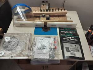 lot 41 image: Ryobi 3 HP Router With Bits, Templates, Guides & Rolling Cabinet