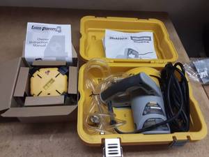 lot 56 image: Laser Level & Work Force WetDry Tile Saw