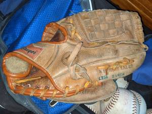 lot 111 image: Easton Hockey Bag, Softballs and Baseball Glove