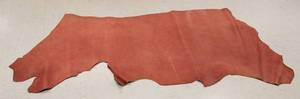 lot 25 image: Half Cow Hide Redwood Football In Color