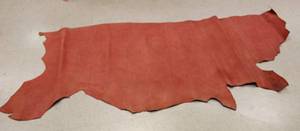 lot 39 image: Half Cow Hide Redwood Football In Color