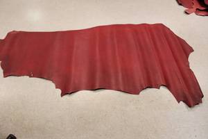lot 46 image: Half Cow Hide Dark Red In Color