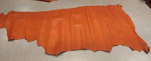lot 59 image: Half Cow Hide Orange In Color
