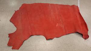 lot 65 image: Half Cow Hide Red In Color