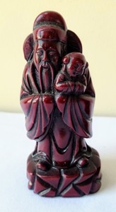 lot 63 image: Two Carved Wood Figurines