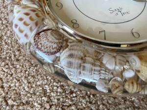 lot 289 image: Sands Of Time Battery Operated Acrylic Seashell Wall Clock