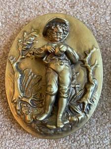 lot 351 image: Plaster Boy And Girl Wall Hangings