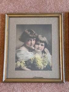 lot 354 image: 2 Vintage Girls With Flower Framed Art Pieces