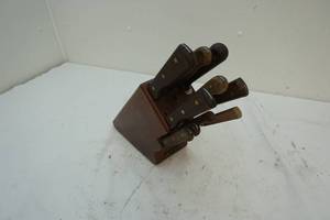 Wood block with knives