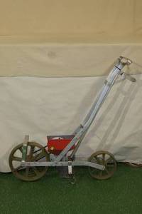 lot 12 image: Vintage Montgomery Ward Walk Behind Planting Tool