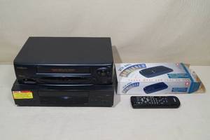 lot 95 image: 2 VCRs and a Tape Rewinder