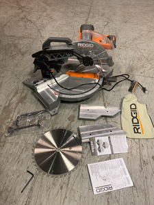 lot 110 image: 15 Amp Corded 12 in. Dual Bevel Miter Saw with LED by RIDGID Customer Returns See Pictures