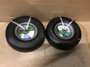 lot 29 image: 11 in. x 4 in. Universal Flat Free Zero Turn Front Wheel Assembly with Smooth Tread by Arnold Customer Return See pictures